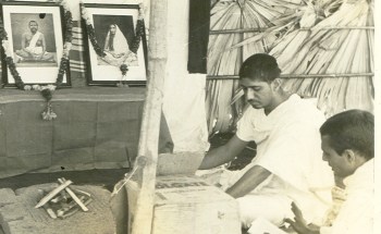 a brahmachari performing hawan for the peace of lives lost during tidal wave devastation 