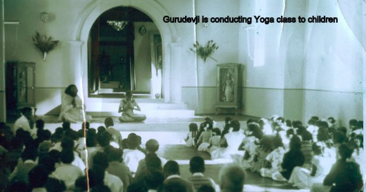 gurudev with children Gurudevji training the children in yogasanas